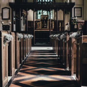 wooden pew near altar