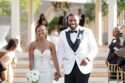 Photo by Carsten Vollrath Happy Bride and Groom Walking Together